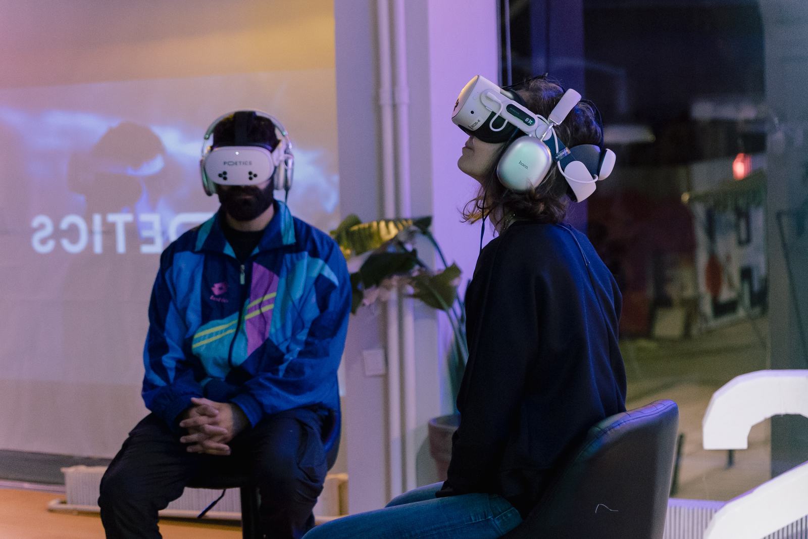 Visitors using Poetics headsets during a public gallery activation